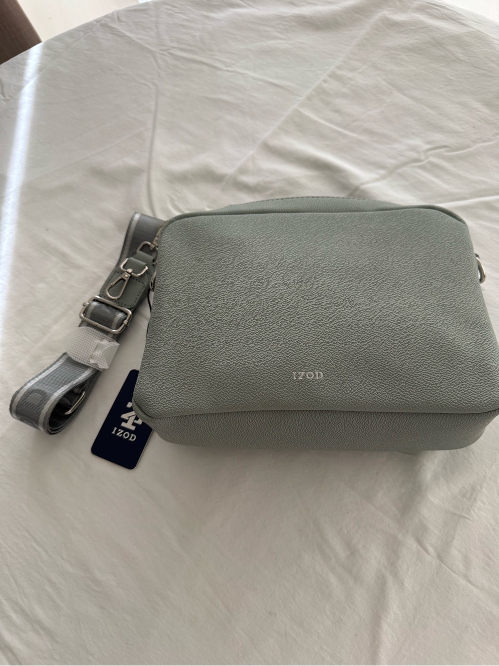 Izod Light Green Crossbody Bag. Light mint green 9”x6.5”x 2.5”
